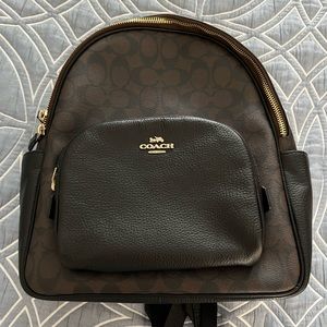 Signature brown Coach backpack. Lightly used and in excellent condition.